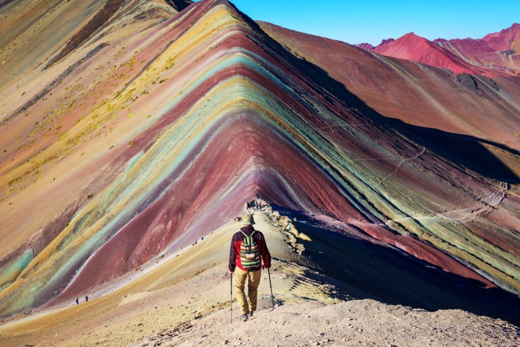 Wanderer auf dem Vinicunca Rainbow Mountain Peru.